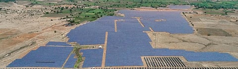 Solar power tariff hits record low, sparks worry about coal’s future 