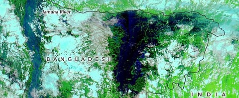 A NASA image taken on July 25, 2020, showing the inundation of the country's northeastern part in navy blue. Photo: NASA Earth Observatory 