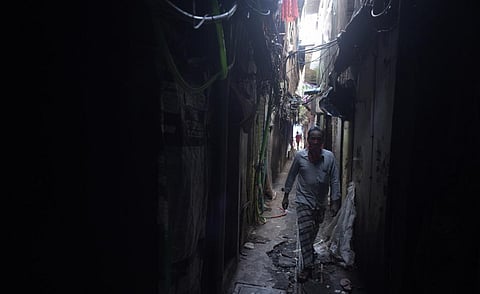 The narrow alleys of Naik Nagar, Dharavi. Naik Nagar residents said nobody ever came for screening or awareness. When they heard the news that Dharavi was peaking, they created a containment zone on their own. Photo: Adithyan PC