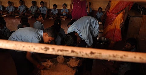 A mid-day meal in a village in Dakshina Kannada district of Karnataka in pre-COVID-19 days. Photo: Savvy Soumya Misra