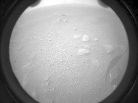 Raw image of the Red planet from the rover. The NASA Perseverance Rover successfully touched down on Mars February 18, 2021. Photo: NASA 