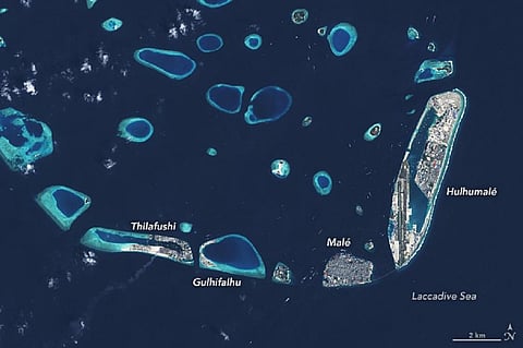 How to face a rising sea? Maldives bets on artificial islands