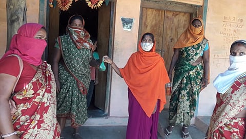 An ASHA worker distributed medicine kits in Madhya Pradesh's Mudha village. Photo: PRADAN 