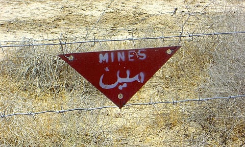 A signboard warning about landmines in Afghanistan. Photo: istock