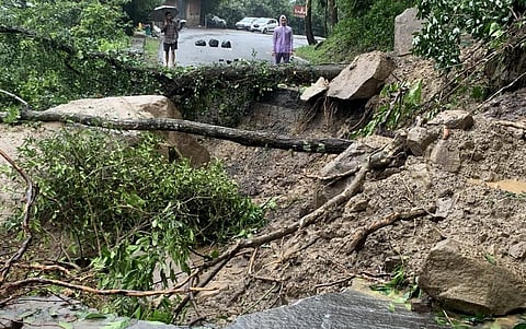 A damaged road in Uttarakhand. Photo: @Atul31garg / Twitter