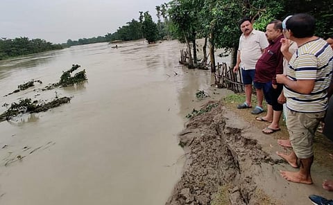 Assam MLA and Minister Ranjeet Kumar Dass inspects a flooded area in the state. Photo: @RanjeetkrDass / Twitter