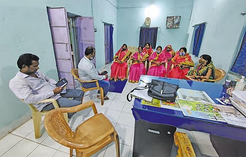 Rural self-help group (SHG) in Baldia Bandha village, Dhenkanal. The SHG helps the sarpanch coordinate between the vehicle with the faecal sludge treatment plant (FSTP) call centre and households.  (Photo: Swati Bhatia, CSE)