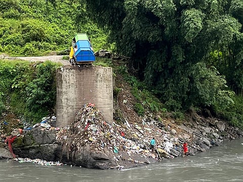 Garbage being dumped on the banks of Kameng river. Photo: Ranju Dodum