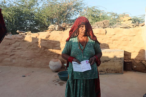 Devki is a red card holder, which should certify she belongs to an impoverished family for her rightful share of rations. Photo: Himanshu Nitnaware
