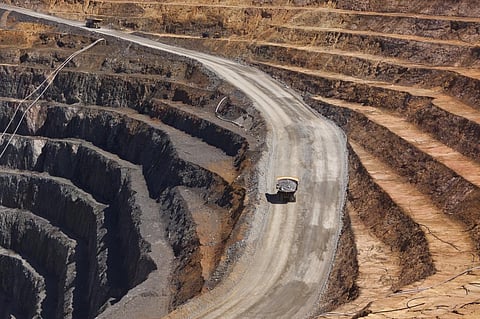 Two trucks transport gold ore from Barrick Cowal Gold Mine in New South Wales, Australia. Photo: Jason Benz Bennee / Shutterstock
