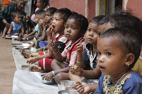 Children upto age six are now being provided hot cooked meals at spot
feeding centres in selected PVTG villages. Source: Aishwarya Mohanty