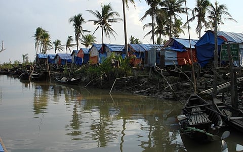 Damaged boats in the aftermath of Cyclone Nargis in 2008. Photo: Marianne Jago/AusAID via Wikimedia Commons