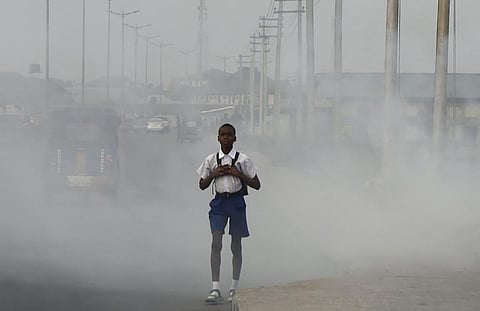 Children and elderly people are vulnerable to air pollution. Photo by Pius Utomi Ekpei / AFP from www.gettyimages.com