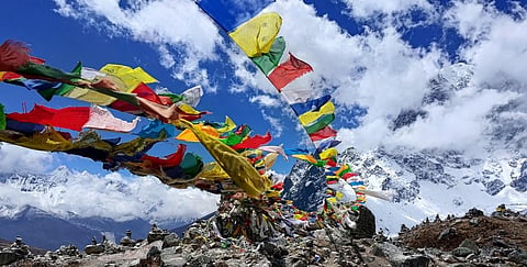 Memorials to climbers who lost their lives on Everest. Photo: Michal Apollo, CC BY-NC-SA