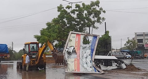 A hoarding damaged by Cyclone Biporjoy in Mandvi, Kutch. Photo: Himanshu Bhayani