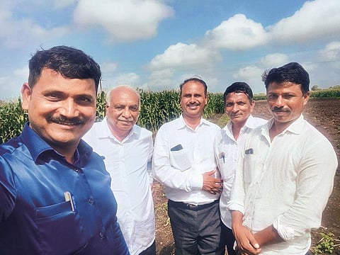 Baban Nanabhau Fand Patil (extreme left), a founder of The Maharashtra Onion Farmers Group, with farmer-members of the network 