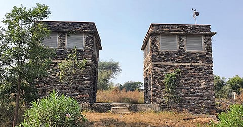 These towers inside the NIIT University in Neemrana, Rajasthan, collect hot air from the outside, which is then naturally cooled through underground tunnels and used for air conditioning campus buildings (Photograph: Sugeet Grover; Illustrations Courtesy: CSE Report And Nzeb.In)