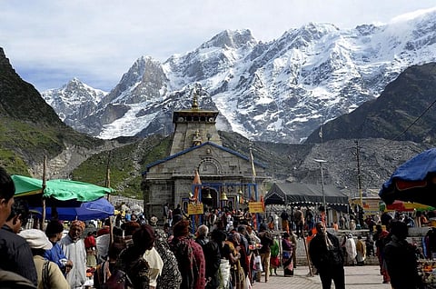 Hindu devotees worship at the Kedarnath Temple in the northern Indian state of Uttarakhand