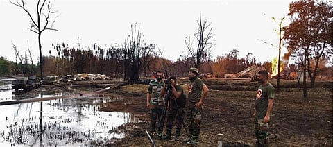 File photo of Indian Army soldiers assessing the situation at Baghjan near the blowout well. 