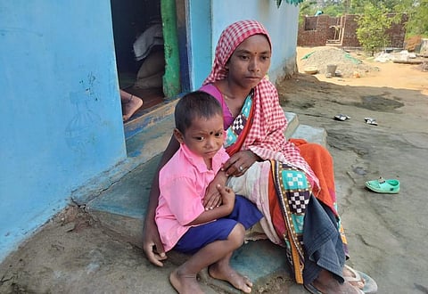 Remati and her young son. Photo: Ajit Panda