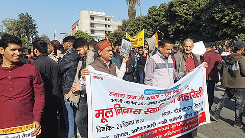 Uttarakhand residents held a protest in Dehradun on December 24, 2023, urging for stringent laws to regulate the 
sale of land to 
non-residents (Photograph: Rajesh Dobriyal)