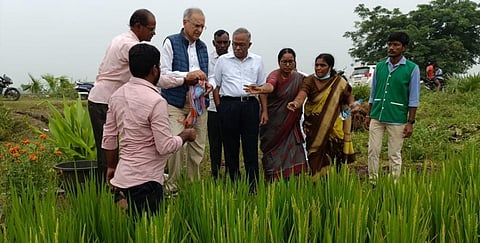 K Meerabi (right), T Vijay Kumar (centre) and Pawan Sukhdev (left). Photo provided by M Raghuram 