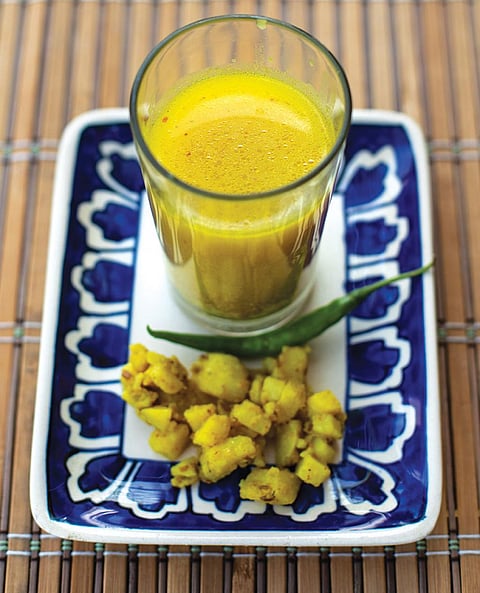 Fermenting leftover potato sabji with water, red mustard  seeds and salt can help create a tangy and healthy drink  (Photograph: Vibha Varshney)