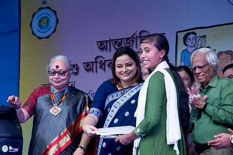 Rajoshree Banik (in green and white) being awarded the 'Veerangana' award. Photo provided by CRY