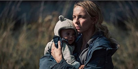 The End We Start From stars Jodie Comer as ‘Woman’, the lead character who gives birth to her baby as extreme floods hit London. Screen grab from promotional trailer of movie