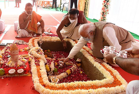 India's Prime Minister Narendra Modi performing a Hindu ritual, 'Bhoomi Pujan', at the foundation stone laying ceremony of the country's new parliament building. Photo: Press Information Bureau, Government of India