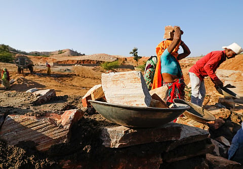 Labourers working for a water conservation project under the Mahatma Gandhi National Rural Employment Guarantee Act in Rajasthan’s Dungarpur district.