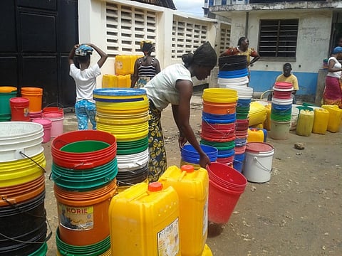 Residents queue up to fill water in buckets
