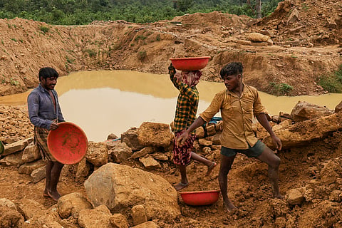 Arvind Gond (right),has been a labourer since the age of twelve. He currently works in a diamond mine. 