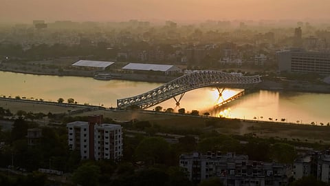 Beyond the thermometer: Ahmedabad uses cool roofs, misting bus stops & heat insurance for climate resilience