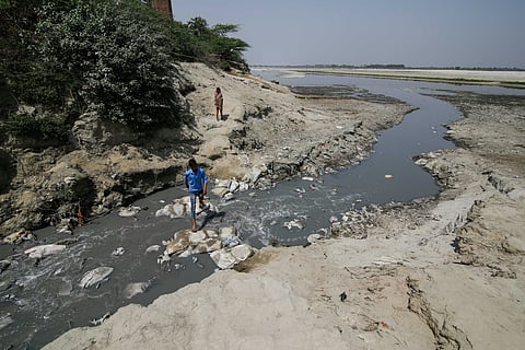 Untreated sewage from a drain in Kanpur is flowing into the Ganges.