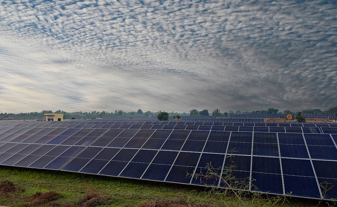 Adani Green to Invest Rs 25,000 Crore An...