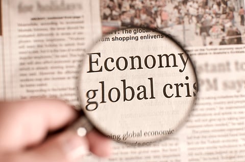 World economy not in recession yet, but economists see tougher years ahead. 