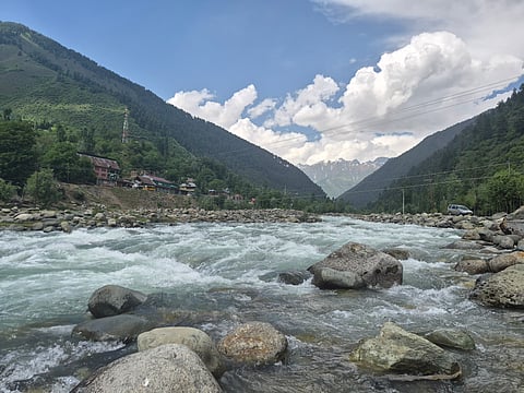 Wangath Nullah, fed by two glacial lakes near the base of the iconic Harmukh Peak, flowing between the surrounding hills.