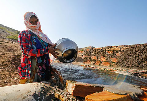 Labourers working for a water conservation project under the Mahatma Gandhi National Rural Employment Guarantee Act (MGNREGA) in Rajasthan’s Dungarpur district.