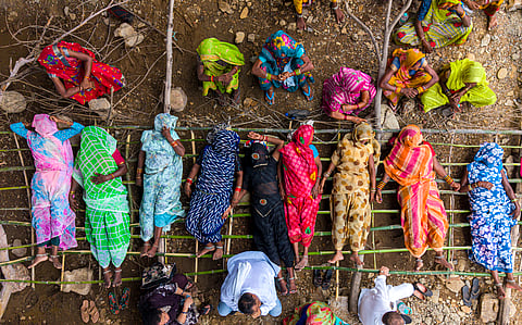 Local tribal residents stage a symbolic pyre protest against the Ken-Betwa River Linking Project in Madhya Pradesh’s Bundelkhand region, invoking the slogan, "Nyay do, ya maar do" ("Give us justice, or kill us"), to demand justice over the project's impacts.