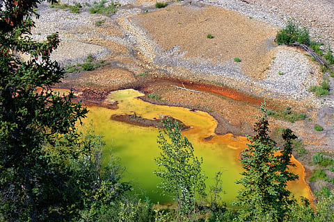 An acidifying body of water in Yukon. Acidification is driven by the weathering of rocks, which release acid, sulphate and toxic metals into groundwater and streams. 