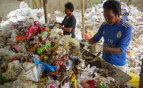 Workers in the eco center of Mayapur, cleaning, sorting and recycling waste. Photo: iStock