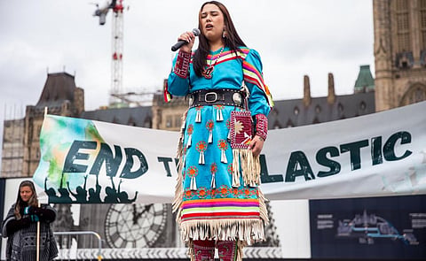 An indigenous activist in the march on Sunday. Photo: Ben Powess, Survival Media Agency