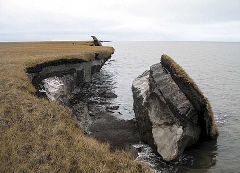 A collapsed block of ice-rich permafrost along Drew Point, Alaska. Photo: Benjamin Jones /  United States Geological Survey