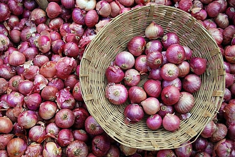 Onions for sale in the weekly market in Malkapur, Maharashtra. Photo: iStock 