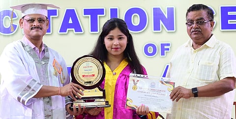 Student being felicitated 