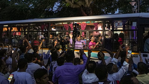 A delegation of junior doctors leaves in a bus from their dharna site near Swasthya Bhawan for a meeting with West Bengal Chief Minister Mamata Banerjee at her Kalighat residence, in Kolkata, West Bengal