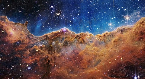 The 'Cosmic Cliffs' of the Carina Nebula are seen in an image released by NASA on July 12, 2022