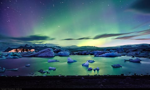 Vivid auroras ripple over Europe and the United States as solar storms reach severe intensity, forcing NASA to delay a Mars mission