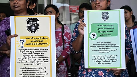 Doctors under the banner of the Kerala Government Medical College Teachers’ Association stage protest at the Government Medical College Hospital, Ernakulam, on Thursday.